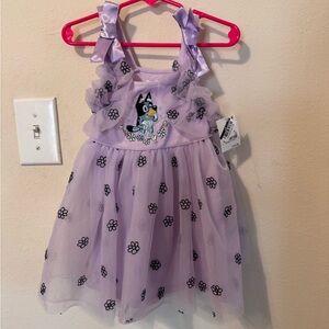 Lilac Dress with Cartoon and Floral Design